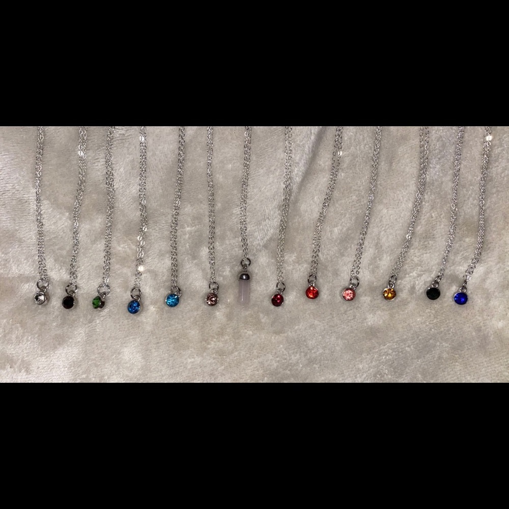 red gem charm necklace